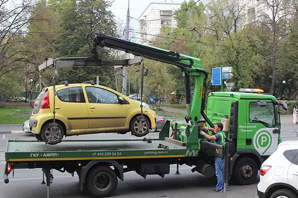 A Car Be Towed With The Emergency Brake On