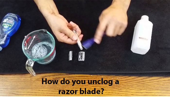 How do you unclog a razor blade?